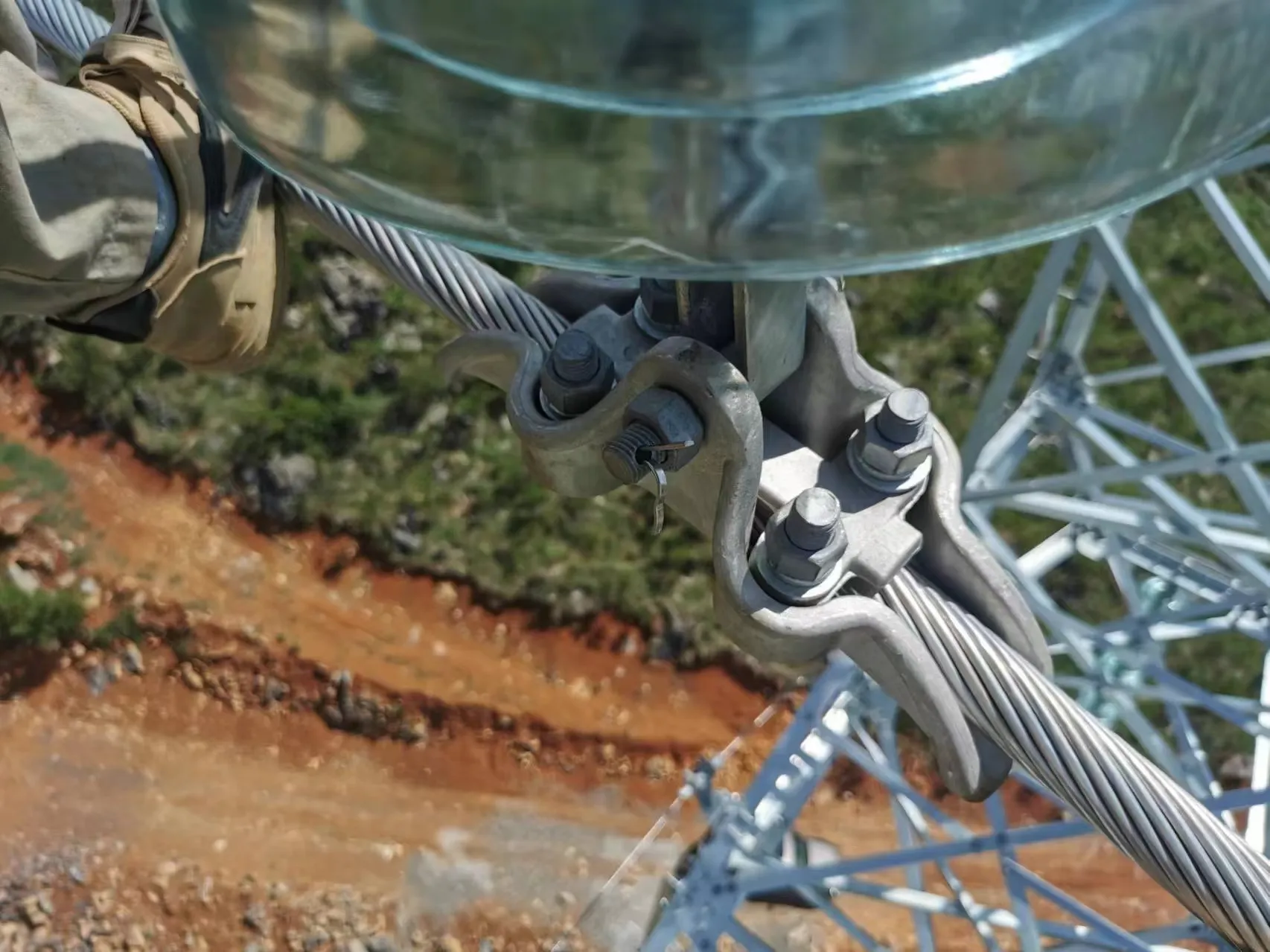 Aluminum alloy tension clamp securing an ADSS cable